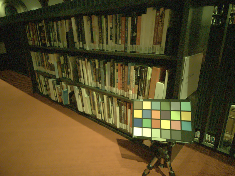 library bookshelves under LED lighting
