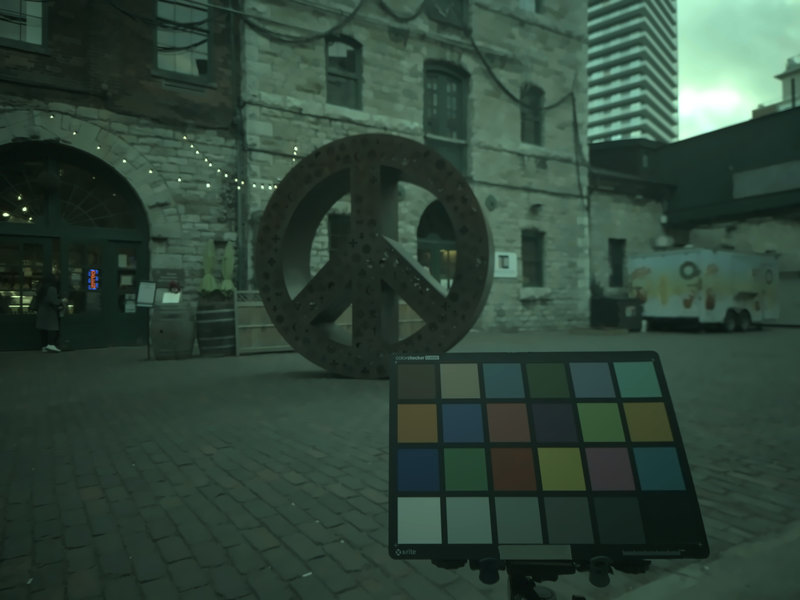 outdoor night scene with a sculpture